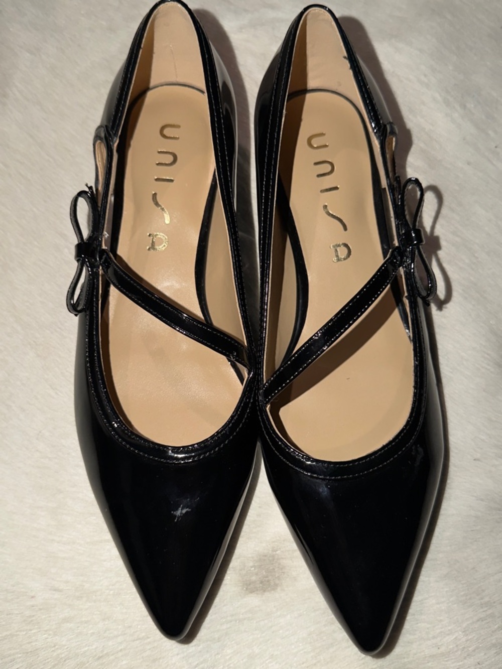 Unisa Black Patent Pointed Mary Jane Flats with Bow Accent